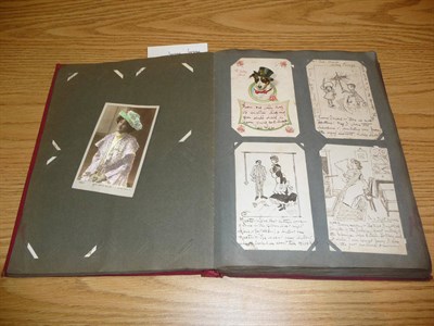 Lot 228 - An Edwardian Postcard Album, containing approximately two hundred and thirty mixed cards, including