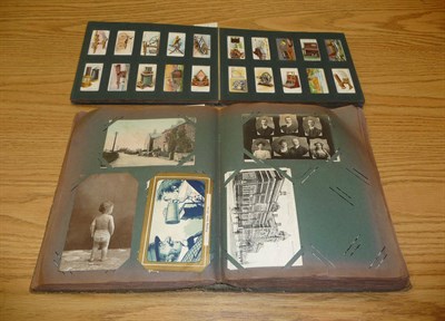 Lot 235 - An Album of Pre-War Postcards, containing approximately three hundred and thirty cards,...