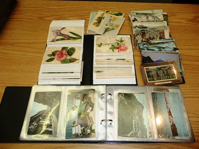 Lot 237 - A Collection of Pre-War Postcards, including an album of German floral cards, an album of...