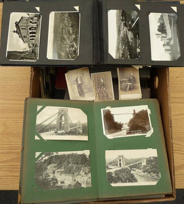 Lot 219 - A Collection of Albums of Travel Photographs and Postcards, including an album of snapshots...