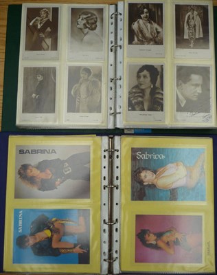 Lot 235 - An Album of Postcards of 1920's and 1930's Actors and Actresses, containing two hundred and...