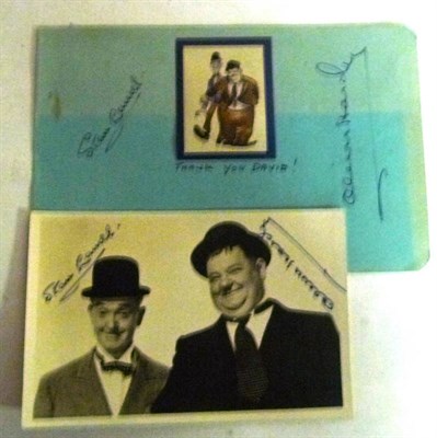 Lot 311 - A Signed Postcard Sized Black & White Photograph of Stan Laurel and Oliver Hardy, with pen...