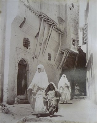 Lot 99 - Algerian PhotographsA folio album with 91 laid down photographs and additional loose image,...