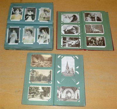 Lot 155 - Three Albums of Mixed Postcards, containing approximately six hundred pre-war cards, including...