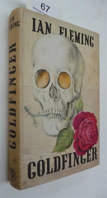 Lot 67 - Fleming (Ian) Goldfinger, 1959, Cape, first edition, black cloth, blind-stamped skull with gold...