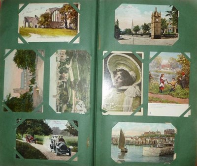 Lot 227 - An Album of Mixed Postcards, approximately three hundred and fifty pre-war cards, including...