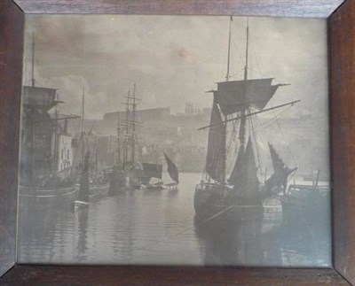 Lot 94 - Sutcliffe (Frank Meadow) Three photographs of Whitby; View of town and Priory with fishing boats in