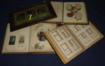 Lot 102 - Three 19th Century Padded Leather Photograph Albums, with clasps, containing some carte de...