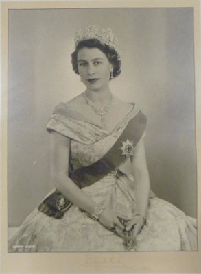 Lot 71 - Queen Elizabeth II Large portrait photograph by Dorothy Wilding, lower margin signed and dated...