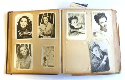 Lot 91 - An Album of Photographs of Film and Stage Stars, some signed, mostly facsimile, stars include...