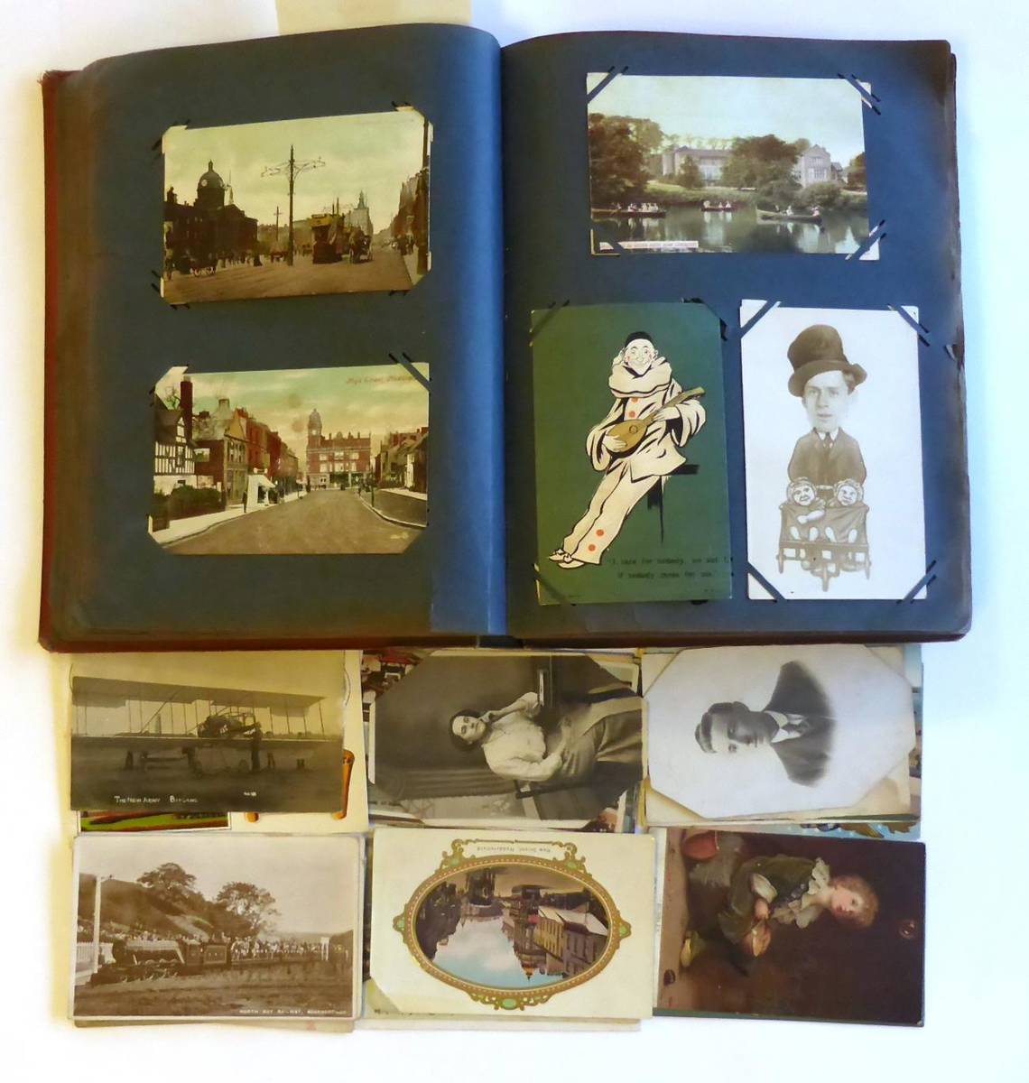 Lot 123 - An Album of Mixed Postcards, containing approximately two hundred and fifty pre war cards,...