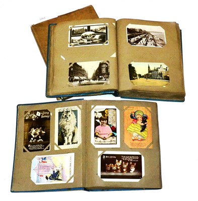 Lot 170 - Two Albums of Pre War Postcards, subjects include comic, glamour, military, greetings,...