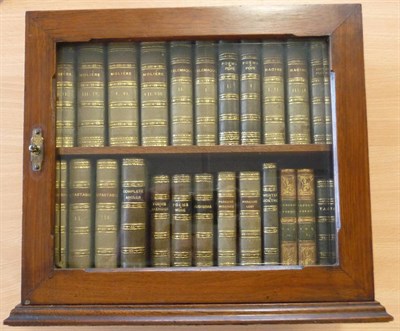 Lot 28 - Desk Bookcase Twenty-four calf bound small books, including Moliere, Pope, Milton, Cowper, Walton's