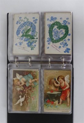 Lot 123 - Three Albums of Mixed Pre-War Postcards, including cat minstrels, Tom B. illustrated, Uk and...