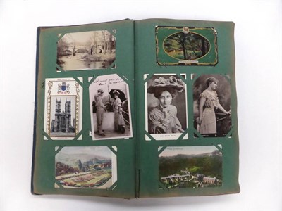 Lot 128 - A Large Album of Postcards, containing approximately four hundred pre war cards, including...