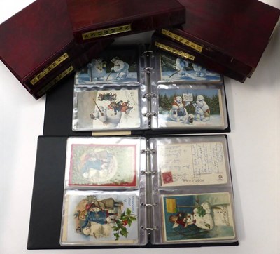 Lot 152 - Snowmen - approximately six hundred cards, mainly pre war colour printed, in seven albums