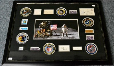 Lot 114A - A Framed Apollo Moonwalker Montage, comprising a large colour photograph, signatures of all...