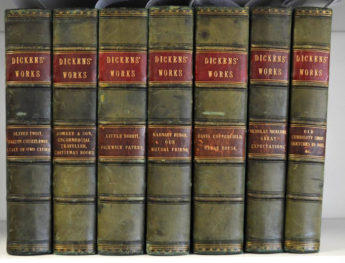 Lot 48 - Dickens (Charles) Seven volumes, each containing two novels, n.d. Chapman & Hall, green Morocco...