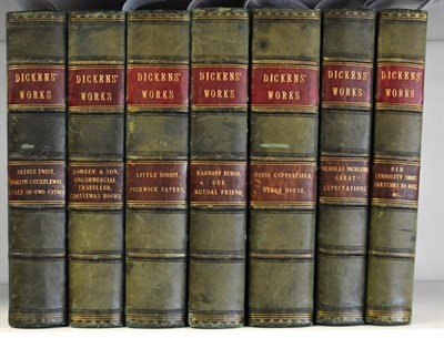 Lot 48 - Dickens (Charles) Seven volumes, each containing two novels, n.d. Chapman & Hall, green Morocco...