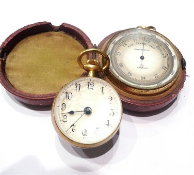 Lot 6 - A pocket barometer retailed by Harrods and a magnified ball desk watch