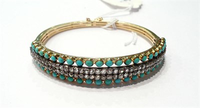 Lot 14 - A diamond and turquoise set bangle