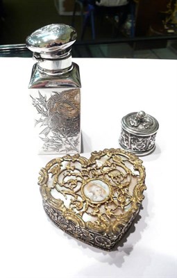 Lot 36 - A silver scent bottle decorated with birds, hallmarks for Sampson Mordan & Co, London, 1883, a...