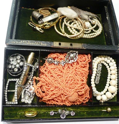 Lot 46 - A jewellery box containing a diamond set stick pin, damaged bangles, brooches, rings and paste...