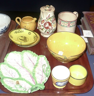 Lot 50 - A collection of six 18th century/modern yellow glazed items, a creamware milk jug and...
