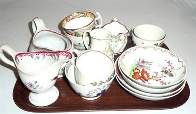 Lot 54 - A small tray of English 18th century polychrome porcelain, including a New Hall helmet jug, tea...