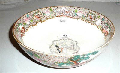 Lot 63 - An English porcelain punch bowl, circa 1800, printed and overpainted in the Chinese mandarin...