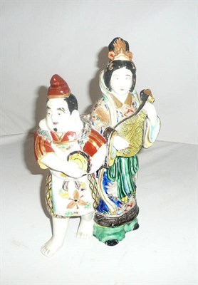 Lot 69 - A Chinese figure group