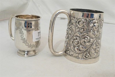 Lot 77 - Embossed silver christening mug and another, approx 9 oz
