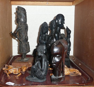 Lot 101 - An African Benin style bronze figure, an African carved wood group and other carved figures
