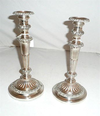 Lot 134 - A pair of Sheffield plate candlesticks