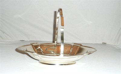 Lot 155 - An oval silver basket with swing handle, 26oz