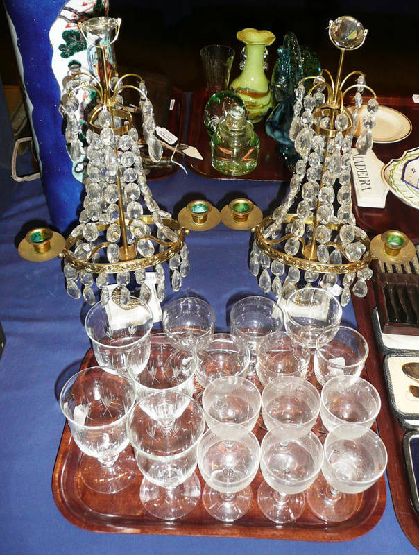 Lot 186 - A pair of brass two branch candelabra with glass drops and a quantity of drinking glasses