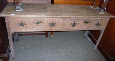 Lot 587 - Oak two drawer low dresser
