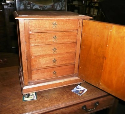 Lot 598 - Oak collector's cabinet