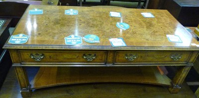 Lot 600 - Reproduction walnut coffee table fitted with two drawers