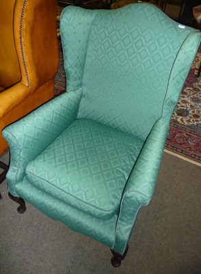Lot 621 - Arch back wing chair