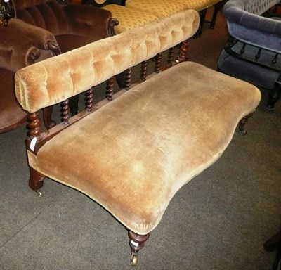Lot 626 - Victorian walnut sofa with turned supports