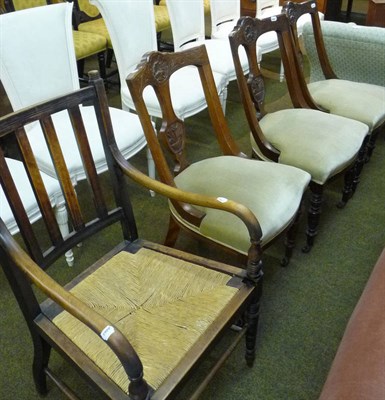 Lot 627 - Three Victorian walnut chairs and a rush seated open armchair (4)
