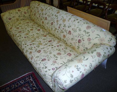 Lot 634 - Large Victorian style four seater sofa upholstered in yellow floral dralon  Subject to VAT