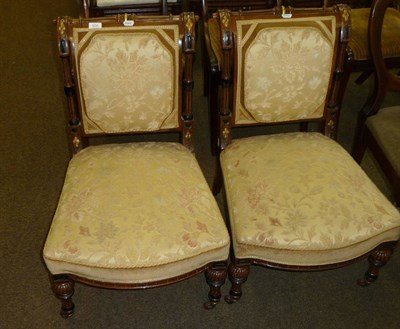 Lot 636 - Pair of Victorian walnut and parcel gilt nursing chairs