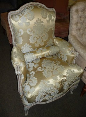 Lot 642 - Reproduction large bergere in Louis XVI style in silk brocade with squab and bolster