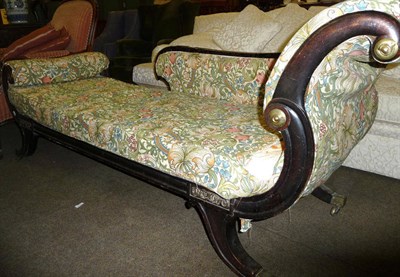 Lot 646 - Ebonised chaise longue