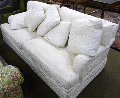 Lot 647 - Three seater sofa in white damask