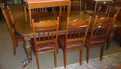 Lot 653 - Large dining table (two leaves only) and ten chairs (8 + 2)