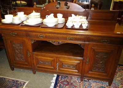 Lot 654 - Late 19th century carved oak sideboard stamped Maple & Co