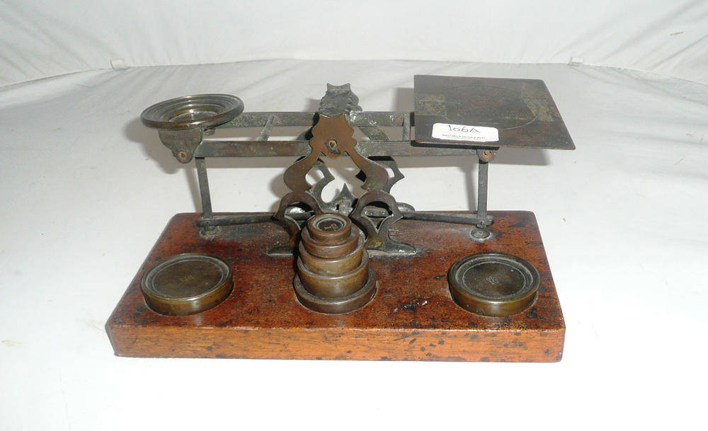 Lot 106 - Brass postal scales and weights